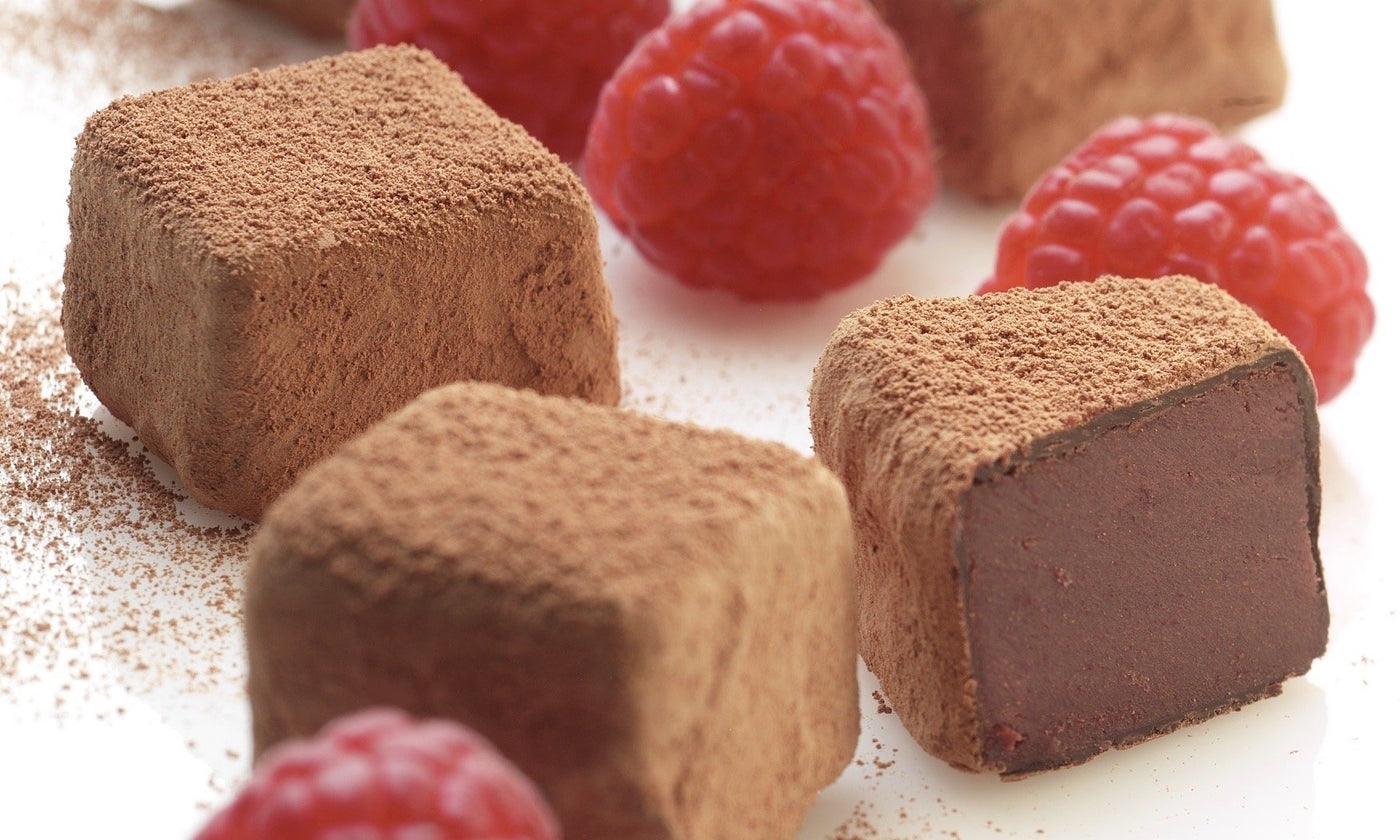 Close-up of delicious vegan and organic raspberry chocolate truffles from Booja-Booja